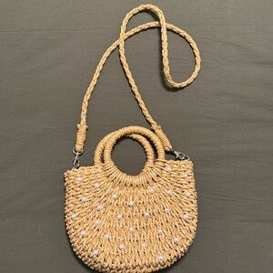 Woven purse with pearls on front with detachable strap